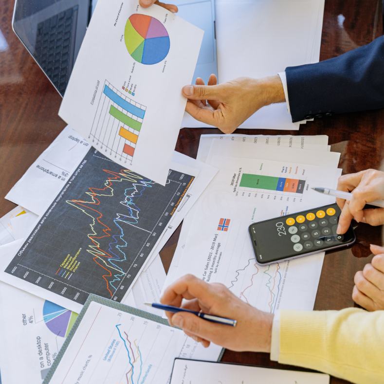 Experts working on data charts and calculations